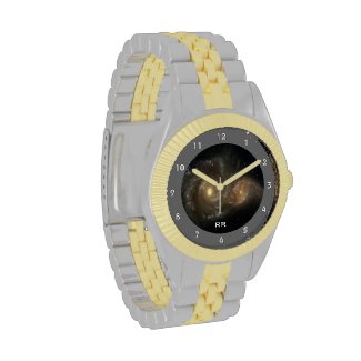 This gold and silver two tone wristwatch features two spiral galaxies with thousands of stars of different ages, sizes and colors intertwining and colliding in swirling clouds of interstellar gas and dust. Add your initials or monogram to personalize.