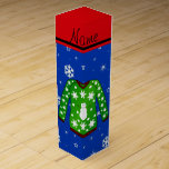 Ugly christmas sweater with green christmas backgr wine gift box