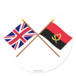 UK and Angola Crossed Flags Round Sticker