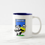 This adorable little panda is too cute! He's featured in front of a large flag from Ukraine and ready to play football and score some goals. This cute design is perfect for football players and soccer fans.