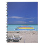 Umbrella and two lounge chairs on beach, Miami Spiral Notebooks