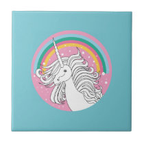 Unicorn surrounded by rainbow and dots blue tiles