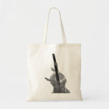 Upright acoustic bass being played by two hands bags