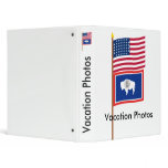 US 44-star flag on pole with Wyoming Binders