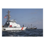 US Coast Guard Cutter Marlin patrols the waters Photograph