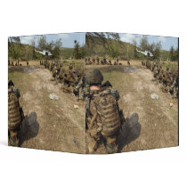 US Marines provide security as a UH-1N 3 Ring Binder