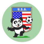 This adorable little panda is too cute! He's featured in front of a large flag from the United States of America and ready to play football and score some goals. This cute design is perfect for football players and soccer fans.