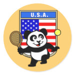 This adorable little panda loves to get out on the court and hits some balls. Panda plays in front of a large flag of the United States of America. This is a great design for anyone who loves to play tennis, watch tennis or just loves cute pandas.