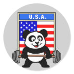 This cute bodybuilding panda loves weightlifting. He stands in front of a large flag of the United States of America. Look how easy he lifts that heavy barbell loaded with weight plates. This design is too cute. Great gifts here for anyone from the USA who loves weightlifting.