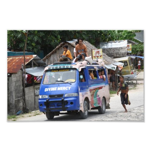 Van with people sitting on the roof. Visayas, Philippines.