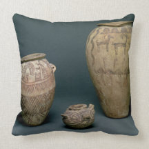 Vase decorated with various friezes of animals and pillow