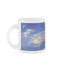 Very structured cloud in a beautiful blue sky mugs