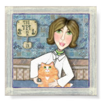 Veterinarian With Ginger Persian Cat posters