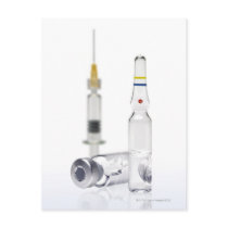 Vials containing medicine for injections and postcard