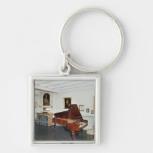 View of a room with a grand piano keychain