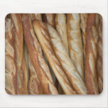 view of bread loaves in bakery window display mousepads