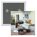 Vintage car with lots of luggage button