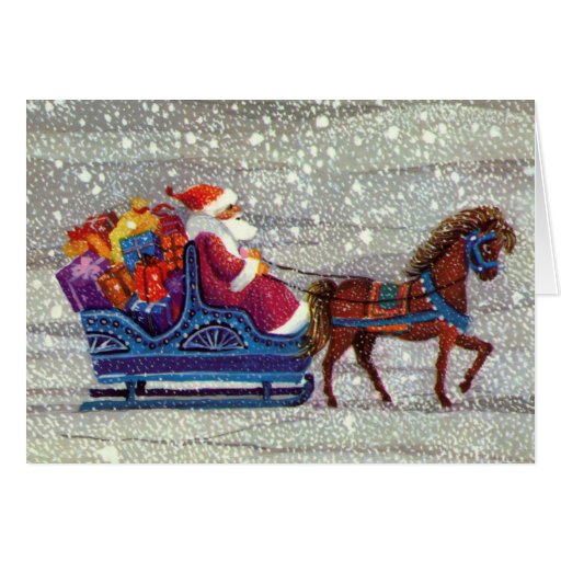 Santa Claus coming to town riding his reindeer sleigh 