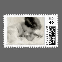 Vintage Mother Kissing Baby in Bassinet postage