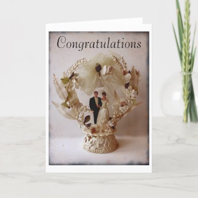 This photo of a vintage 1950s wedding cake topper is a simple yet elegant