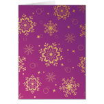 Violet christmas greeting card with snowflakes