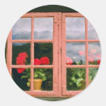 Violet Geraniums In The Window Of A Traditional Ho Round Sticker