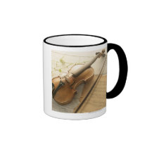 Violín y partitura tazas