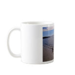 Walking along the beach mugs