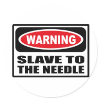 Warning SLAVE TO THE NEEDLE Sticker by warningsignshirts Warning SLAVE TO THE NEEDLE Sticker