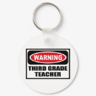 round_keychain - Warning THIRD GRADE TEACHER Key Chain you can customize at www.WarningSignShirts.com and features a red and black warning sign and THIRD GRADE TEACHER in bold black letters to warn the world.  You can also customize your own warning sign Key Chain with the text you want.