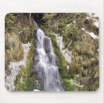Waterfall through snowy bank mousepads
