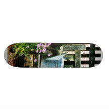 Watering Can and Blue Basket Skate Boards