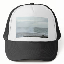 Wave Breaking On Rocks On The Beach hats