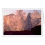 Wave crashing against rock at sunset cards