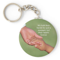 We hold their hands for just a moment, ... keychains