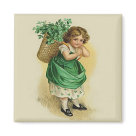 square_magnet - Vintage design features a young Irish girl with a basket of Shamrocks on her back. This wee Colleen is dressed in green with shamrock patterned petticoat showing. Design has been hand retouched. Front text says... The Wearing of the Green: Sizes 