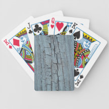 Weathered wood playing cards.