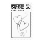 Wedding rings and hearts postage stamp