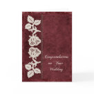 postcard - Send your Wedding congratulations with this elegant, stylish card with a vintage look: deep red background that looks as if it´s made from old material, and cream lace roses as a border. Add your own text to make this card unique!