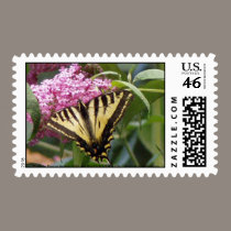 Western Tiger Swallowtail butterfly on pink lilacs stamps