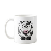 White and black cow mugs