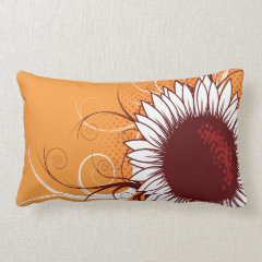 White and Burgundy Flower on Orange Pillows