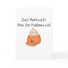  - An adorable baby with one curly hair sits inside an orange pumpkin on customizable Halloween T-shirts, magnets, greeting cards, tote bags, and other items that are perfect for babys first Halloween!: Sizes 