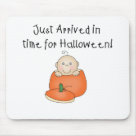 standard_mousepad - An adorable baby with one curly hair sits inside an orange pumpkin on customizable Halloween T-shirts, magnets, greeting cards, tote bags, and other items that are perfect for babys first Halloween!: Sizes 