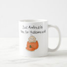basic_mug - An adorable baby with one curly hair sits inside an orange pumpkin on customizable Halloween T-shirts, magnets, greeting cards, tote bags, and other items that are perfect for babys first Halloween!: Sizes  Available colors: white