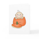  - An adorable baby with one curly hair sits inside an orange pumpkin on customizable Halloween T-shirts, magnets, greeting cards, tote bags, and other items that are perfect for babys first Halloween!: Sizes 