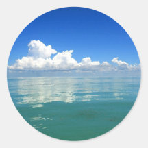 White cloud over a placid ocean stickers