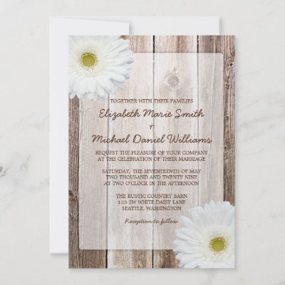 A country themed wedding invitation featuring barn wood and white gerbera