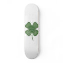white, four leaf clover skateboards