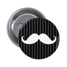 White handlebar mustache on gray black stripes pinback button